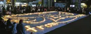 東日本大震災15年、宇都宮でキャンドルアート「とどけ」5000本の明かりで追悼、石巻にネット中継
