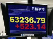 東証反発、史上最高値を更新　半導体関連株に買い注文先行