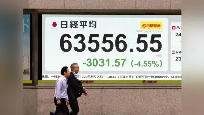 日経平均午前終値2547円安、一時3100円超下落 トリプル安で