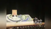上杉邦憲さんお別れ会に450人、祭壇は探査機「はやぶさ」デザイン