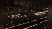 能登半島地震と豪雨からの復興を願い、輪島市の正願寺でキャンドル8000個がともる 熊本の被災地にもエール