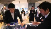 木原官房長官、NTTドコモでIOWN視察「AI社会支える根幹に」