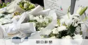 道頓堀ビル火災から1年、献花台に祈り 「命の重さ感じ」