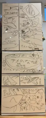 母が寝込んでいる間に冷蔵庫が“サメだらけ”に…8歳息子が描いたアートが話題