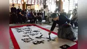 大分県護国神社で奉納揮毫、世界平和と被災地復興を祈る
