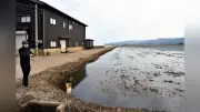 石川・羽咋の冠水水田で悪臭、停電と断水で清掃もできず