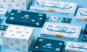 「白い恋人」50周年でパッケージ刷新　雪の結晶モチーフの新ロゴを発表